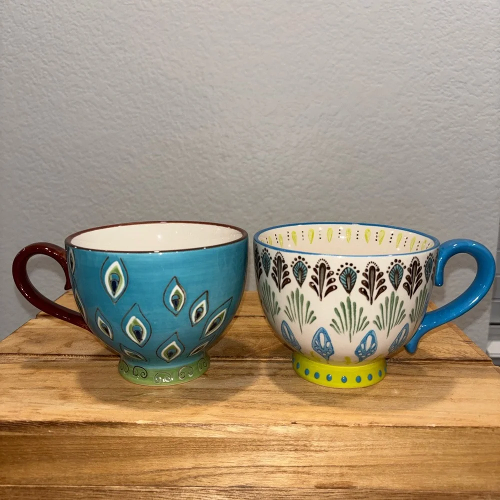 Set of 2 Pier 1 Imports Dolomite Ellie Peacock Hand Painted Footed Mugs 16oz